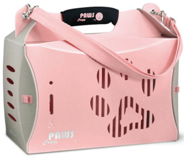 粉紅色寵物籠，上面有爪印。