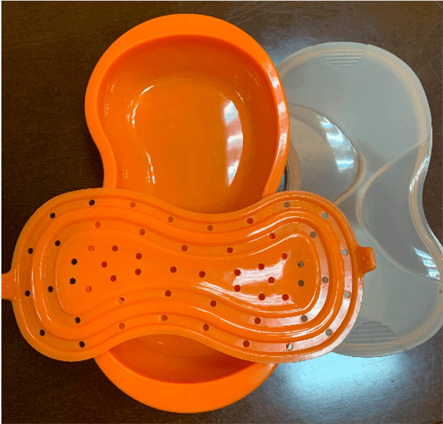 一個塑膠容器,有一個橙色蓋子和一個白色蓋子。