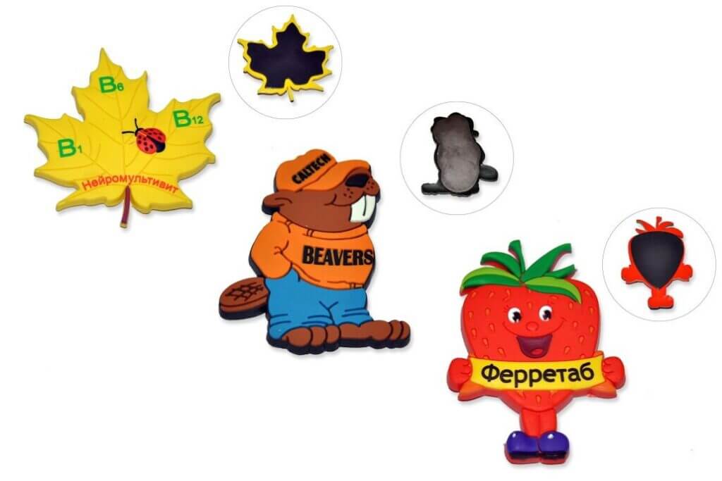 一組磁鐵，上面有一隻熊、一片葉子和一片楓葉。